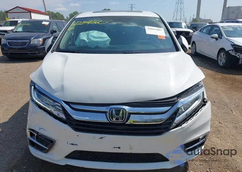 2020 Honda Odyssey Elite z USA, uszkodzony, nr VIN 5FNRL6H99LB058215